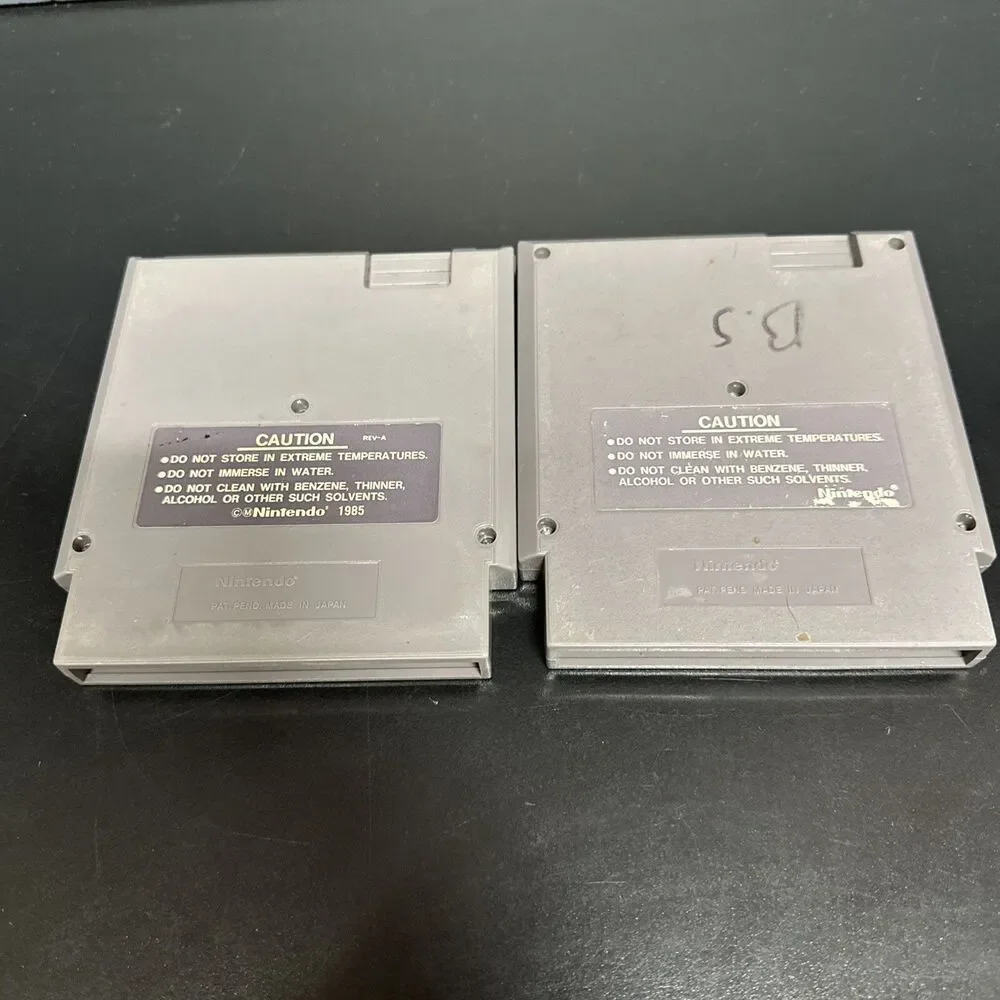 NES PAPERBOY TOY VIDEO GAME AND  SUPER MARIO BROS CARTRIDGE.